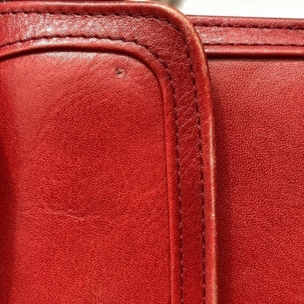 Bosca red leather checkbook wallet